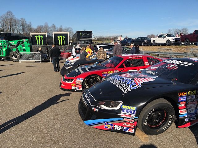 STP 500_Cup cars for fans to visit